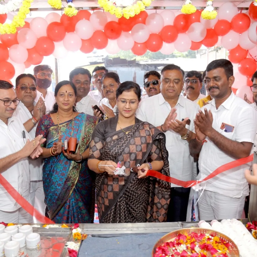 Customers celebrating at a Premacha Chaha outlet opening enlarged